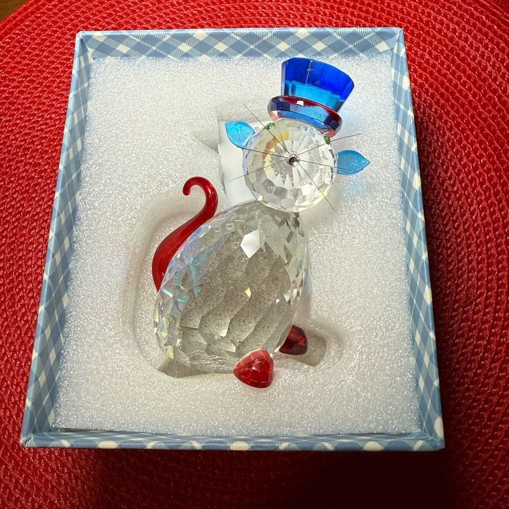 Crystal Cat Figurine with Blue Hat and Red Accents